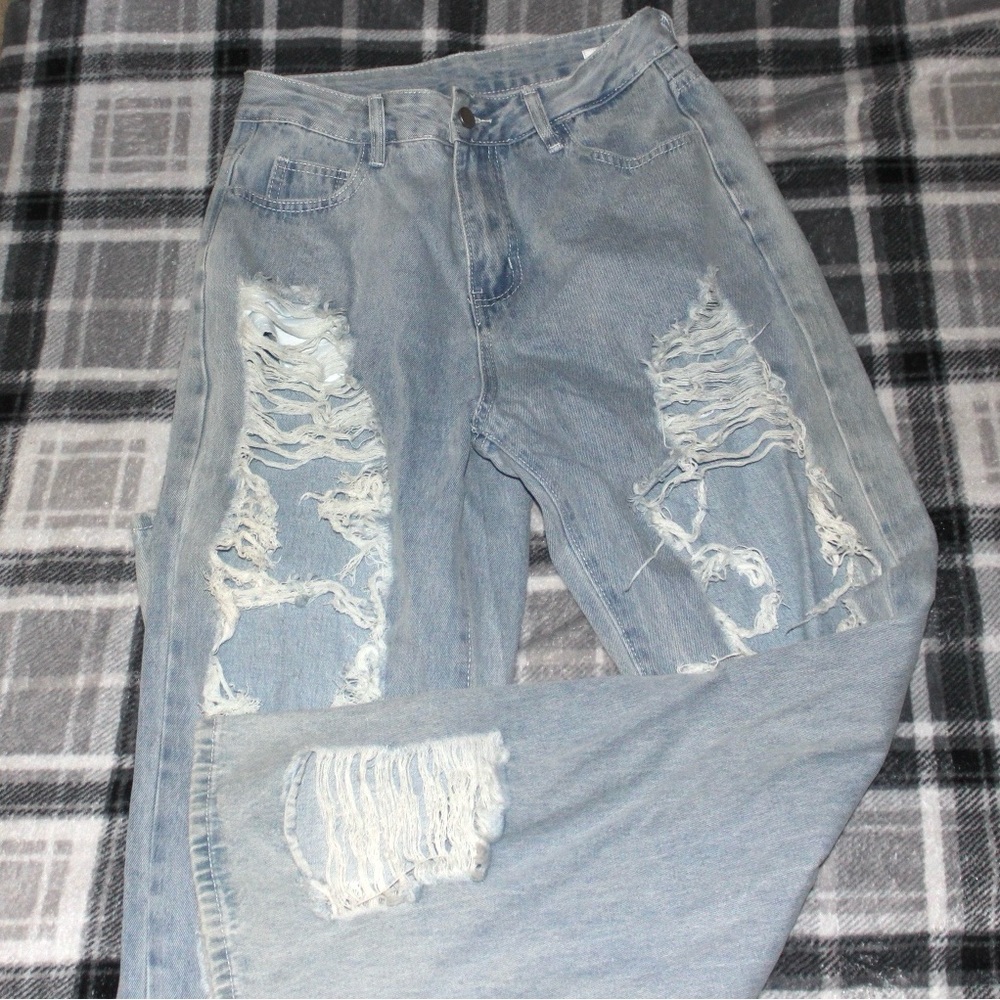 Light wash super distressed boyfriend jeans